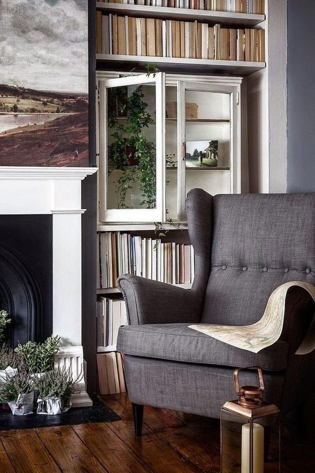 Gray Armchair By The Bookshelf Light