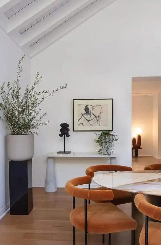 Orange Chairs Against Marble Minimalism