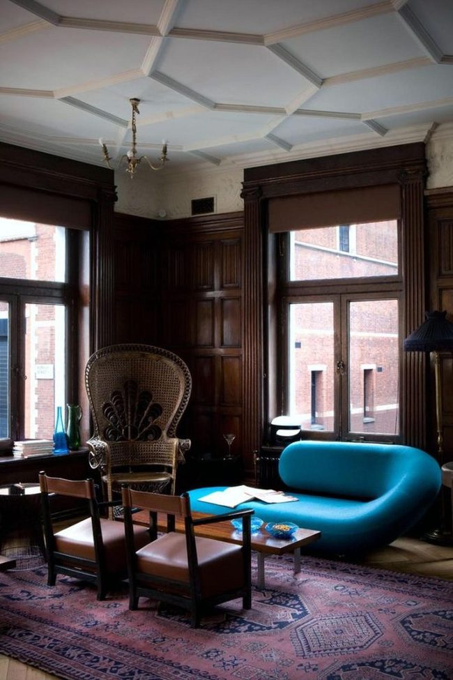Blue Sofa Against Dark Wood