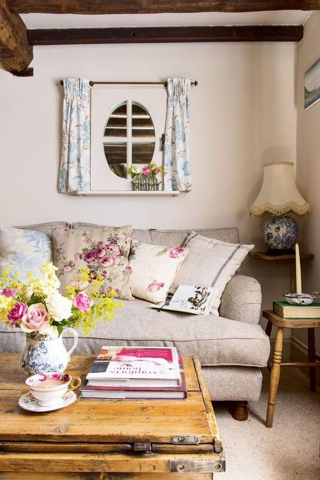 Dark Beams, Gray Sofas, Flowers