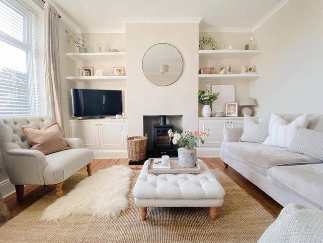 White Cabinet With Dark Fireplace Focal Point