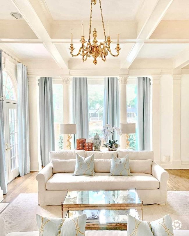 Beige Sofa Gold Chandelier Elegance
