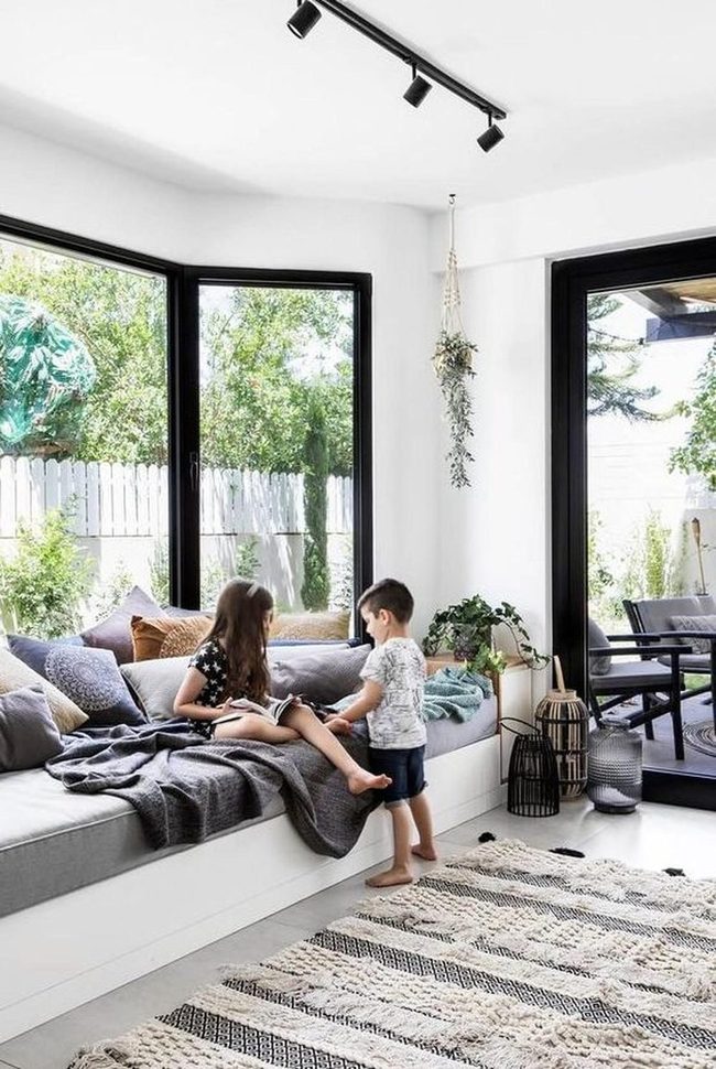 Sunlit Reading Nook With Living Plants