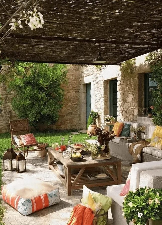 Stone Patio With Vibrant Cushion Seating