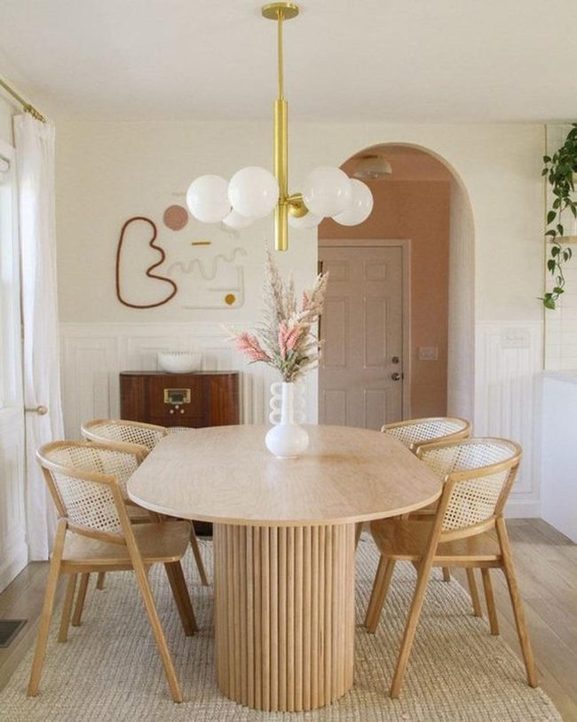 Light Wood Table With Gold Chandelier