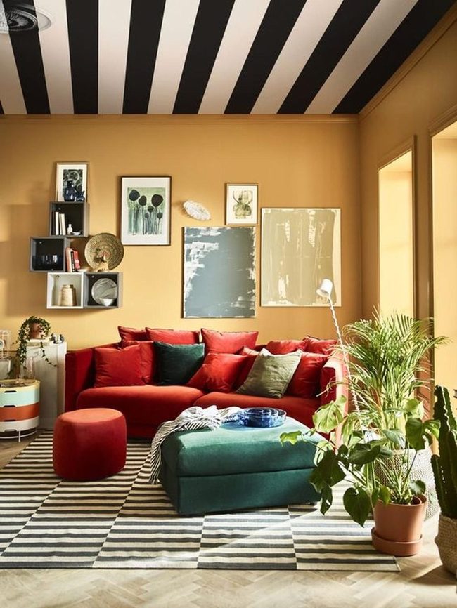 Red Couch Yellow Walls Striped Ceiling