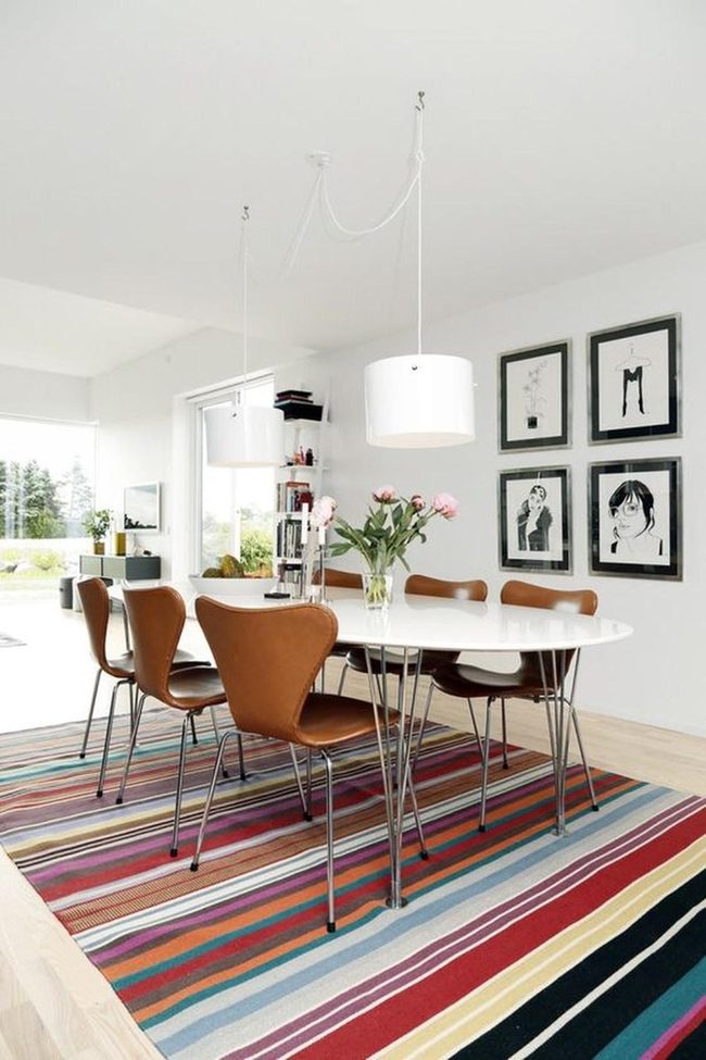 Striped Rug Anchors Modern Dining Space