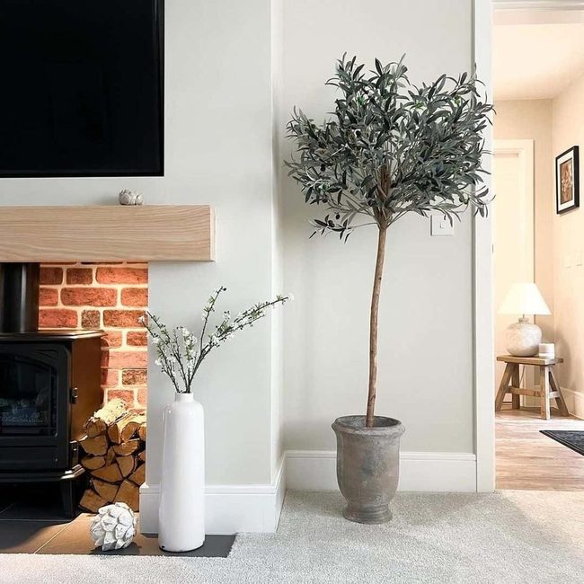Black Tile Fireplace With Gray Warmth