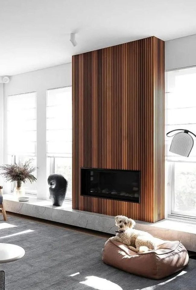 Sunlit Living Room With Warm Wood Fireplace