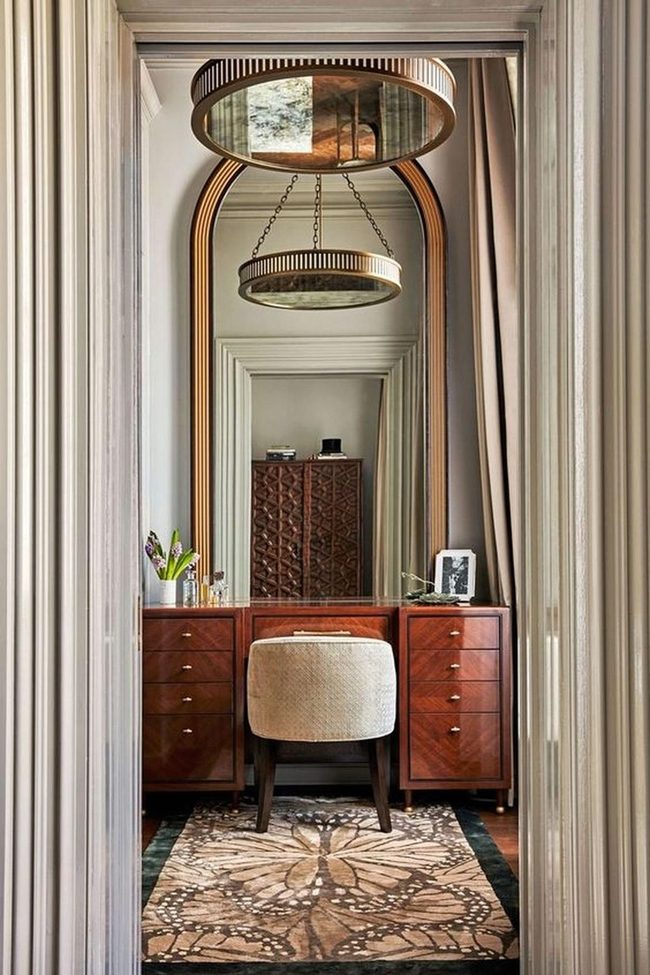 Gold Mirror Brightens Wood-Toned Room