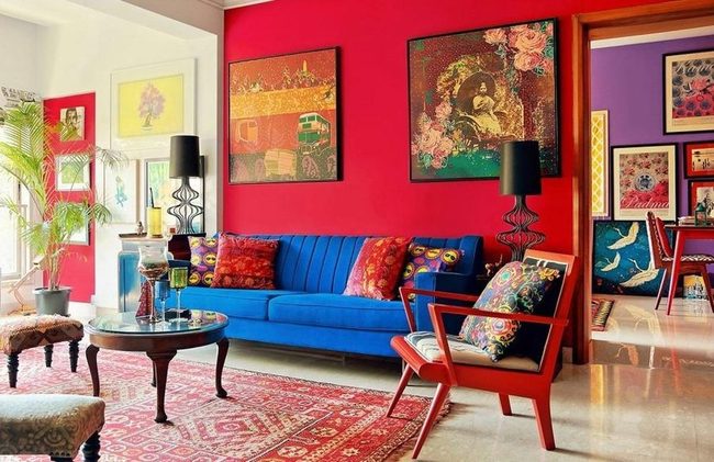 Deep Blue Sofa Bold Red Walls