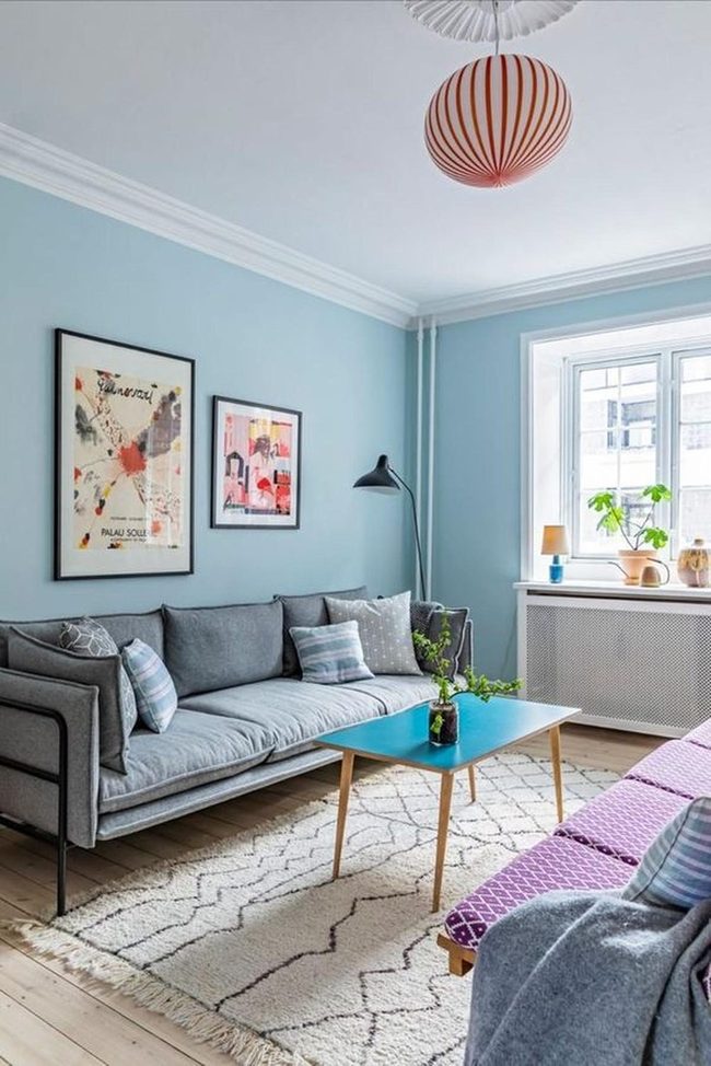 Blue Walls, Green Plants, Wooden Warmth