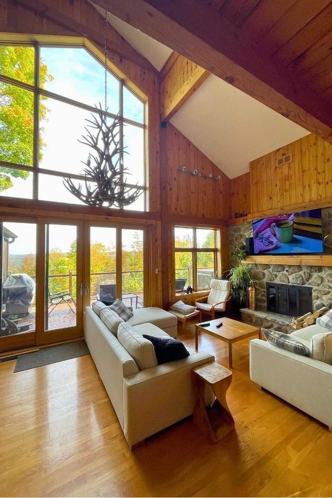 Walnut Table Reflects Snowy Forest View