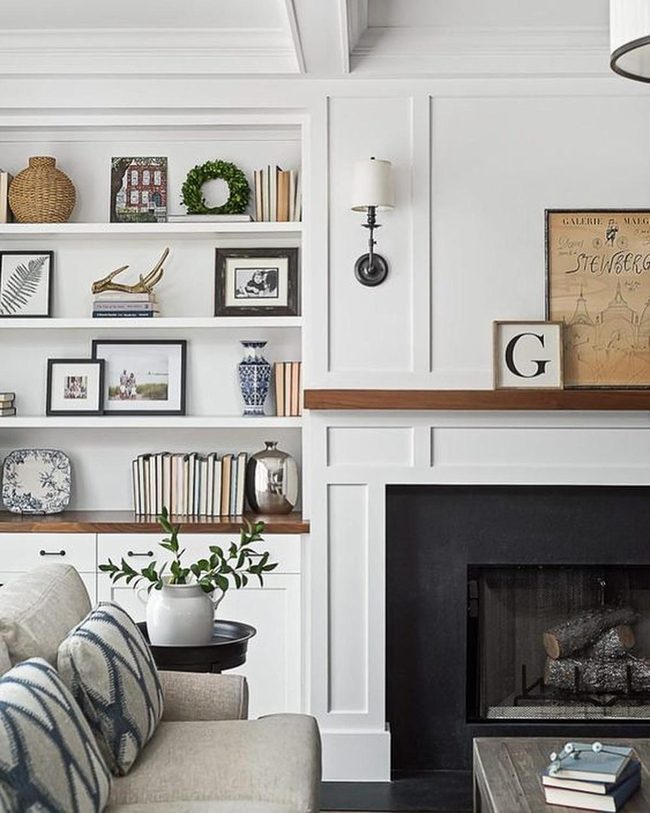 White Walls, Black Fireplace, Blue Accents