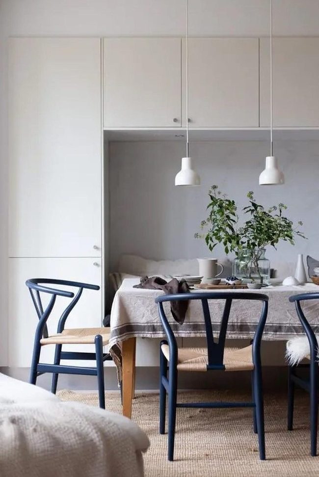 Blue Woven Chairs Define Dining