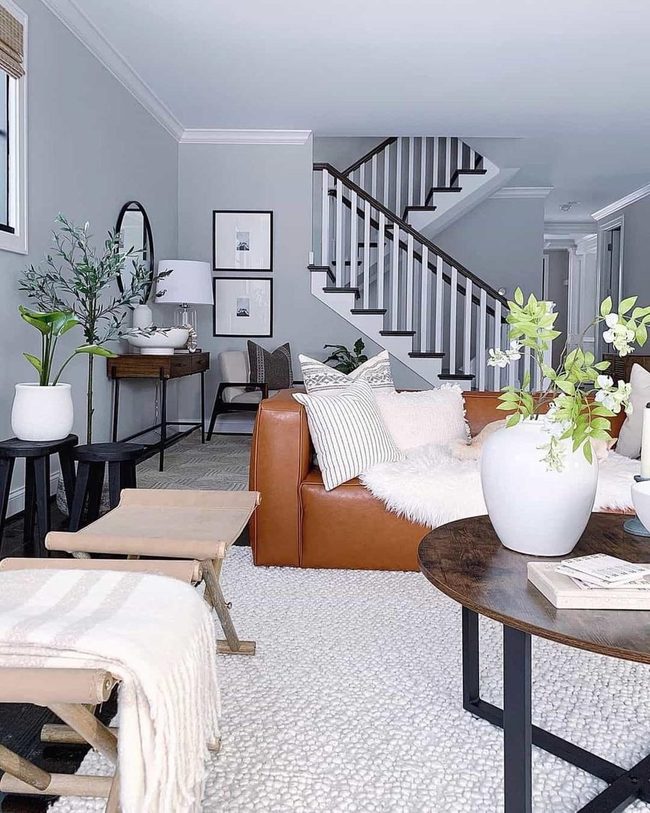 Round Wood Table Anchors Warm Living Room