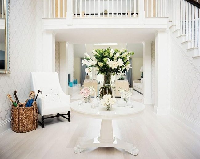White Round Table With Fresh Flowers