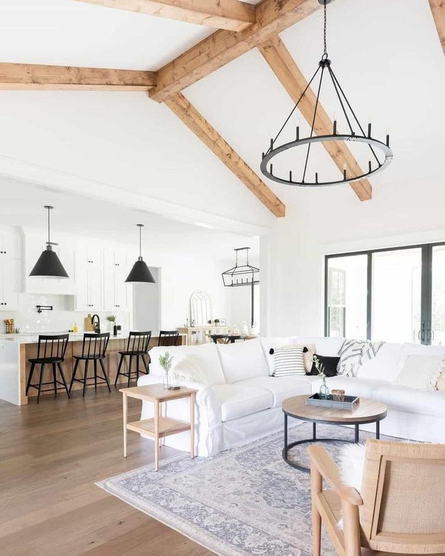 White Sectional Meets Wooden Beams