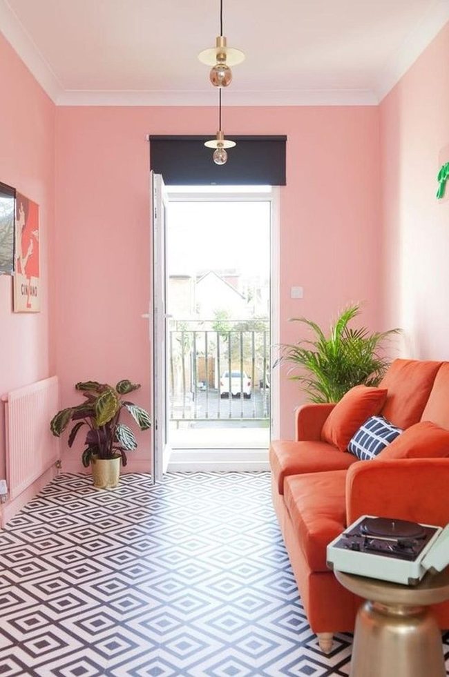 Orange Sofa Pink Walls Gold Light