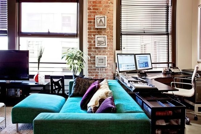 Teal Sofa Meets Exposed Brick