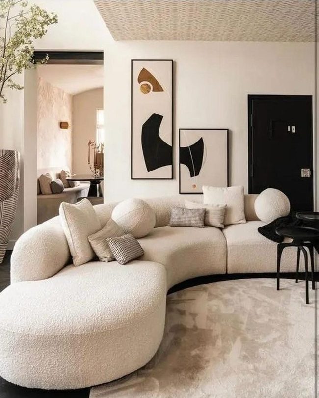 Cream Sofa With Modern Black Art