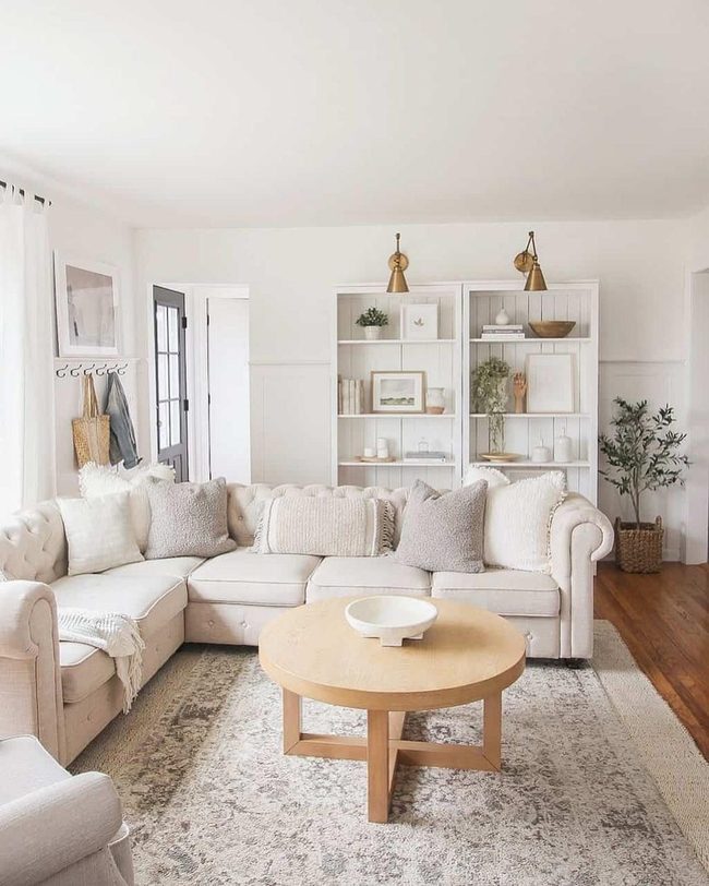 Curved Beige Sectional Layered Rugs