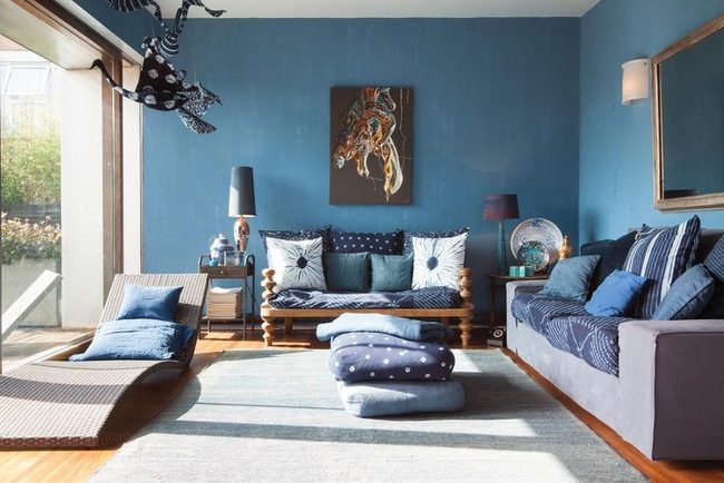 Blue Walls Frame Light-Filled Living Room