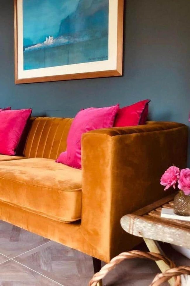 Golden Velvet Sofa Pink Cushion Contrast