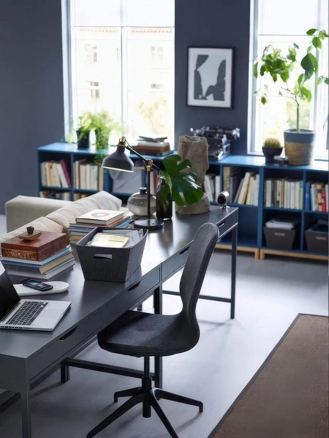 Dark Blue Workspace With Natural Light