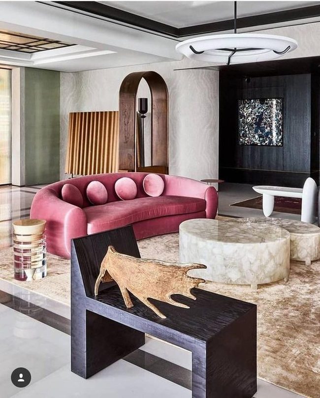 Pink Curved Sofas And Marble Tables