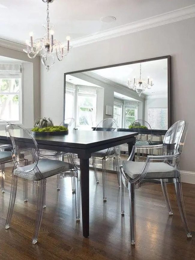 Sunlit Room With Dark Wood Tables