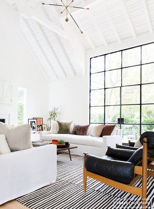 Sunlit White Room With Black Window Frames