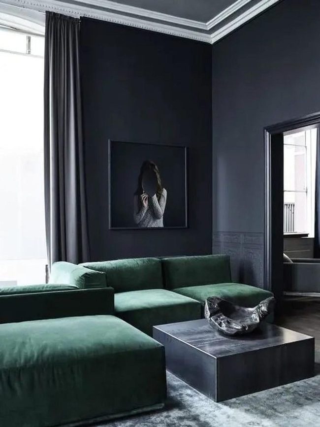 Green Sofas Against Charcoal Walls