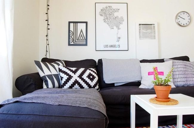 Black And White Patterned Pillows On Dark Couch