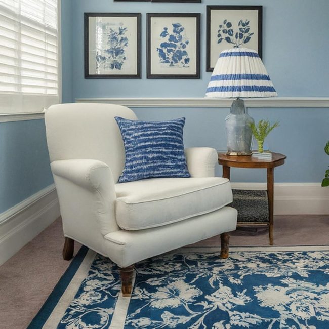 Blue Striped Rug Anchors Neutral Spaces