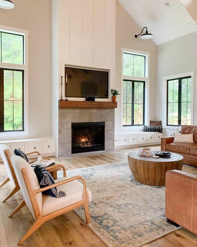 Beige Chairs, Blue Pillows, Stone Fireplace