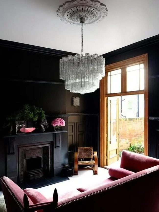 Black Walls, Red Couch, Golden Light
