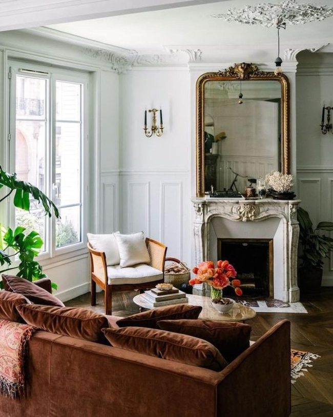 Marble Fireplaces Meet Golden Mirrors
