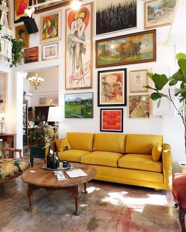 Golden Couches In Eclectic Art Space