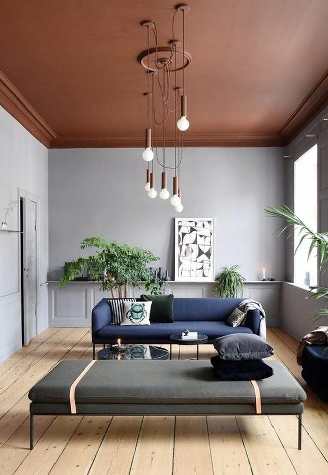 Sculptural Pendant Lights Over Brown Beams