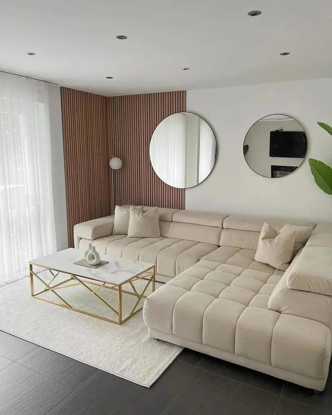 Reflective Circles Over Sofa