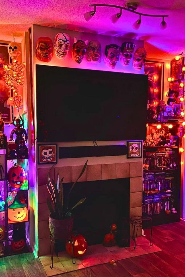 Black Mask Collection Above Television