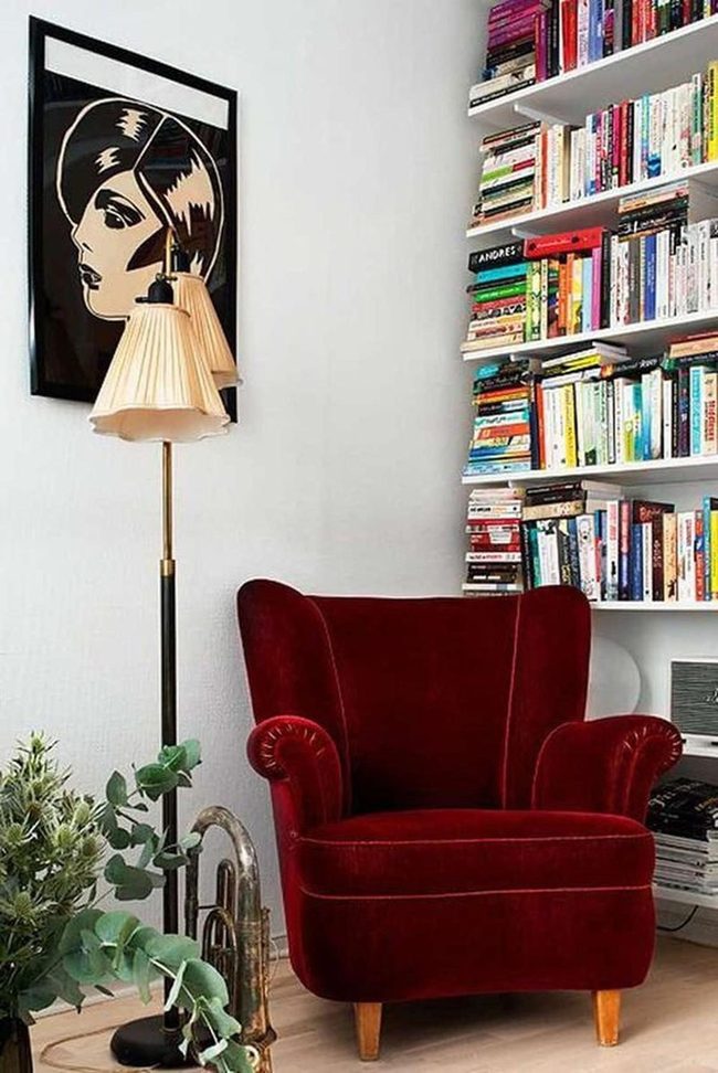 Deep Red Chair With Literary Walls