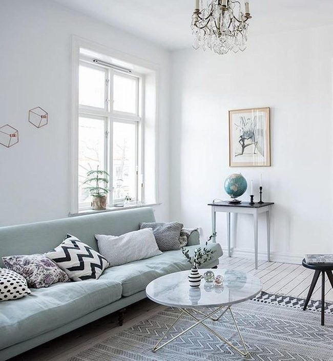 Pale Blue Sofa With Statement Pillows