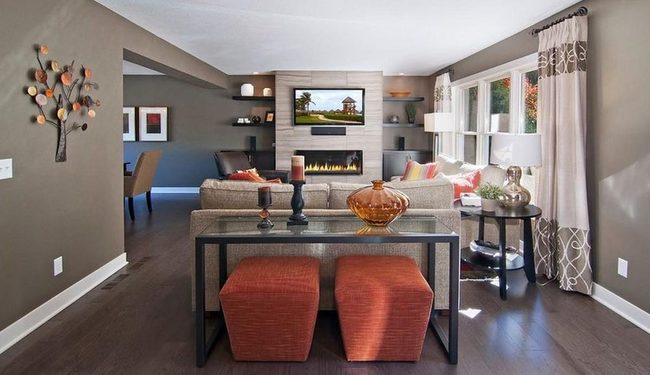 Warm Brown Living Room With Orange Accents