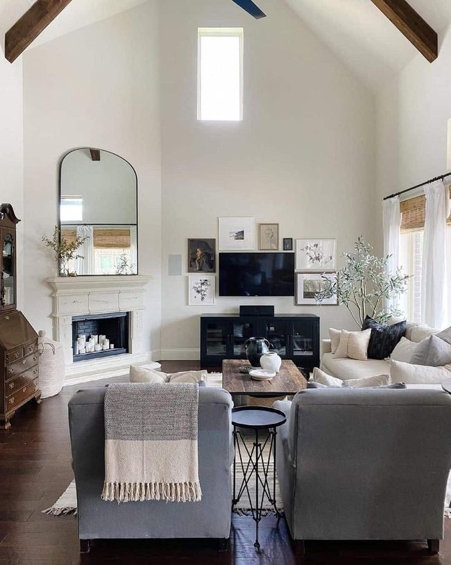 Soaring White Walls With Wooden Beams