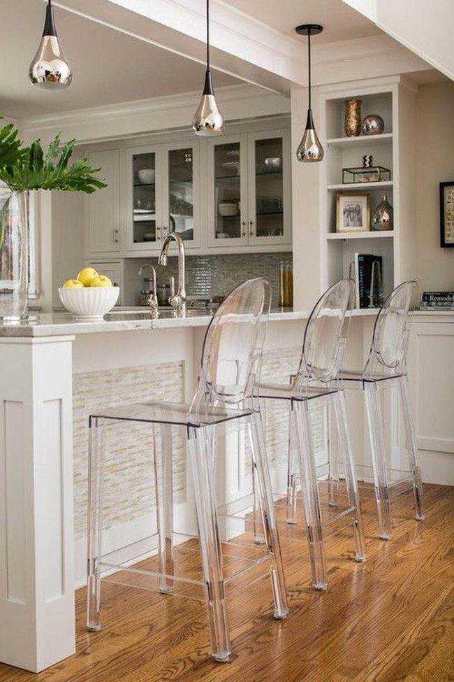 White Kitchen Island With Silver Pendant Lights
