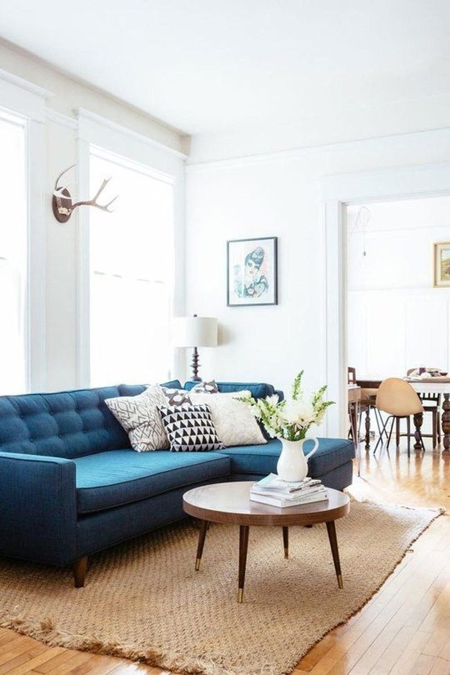 Deep Blue Sofas, Light-Filled Rooms