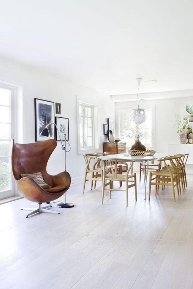 Light-Filled Dining Room With Leather Chair