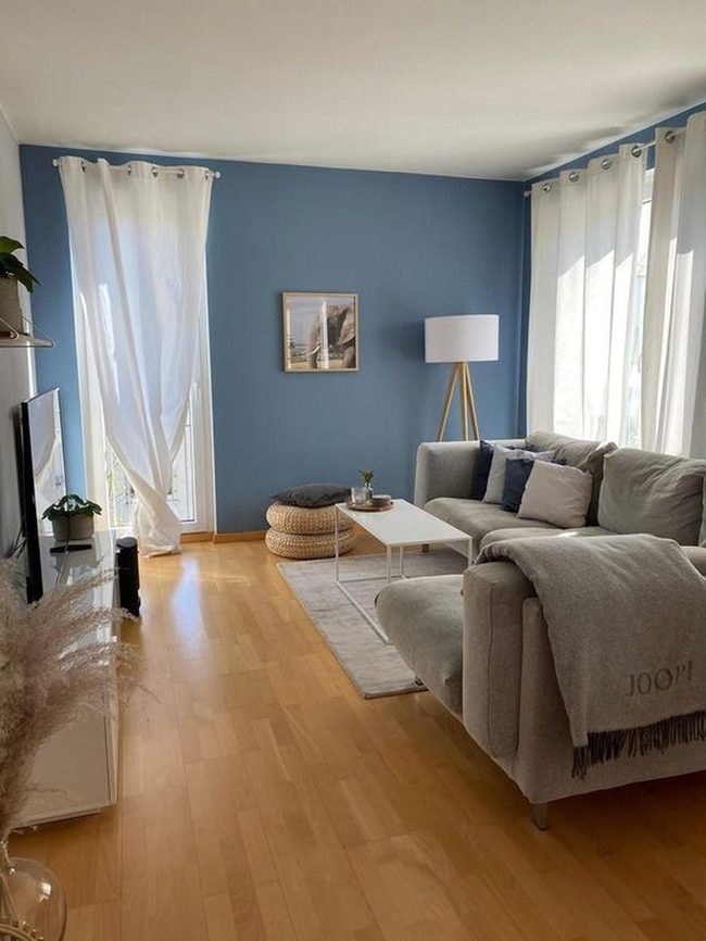 Blue Walls, Light Wood, Gray Seating